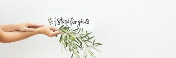 I stand for girls campaign art with olive branch